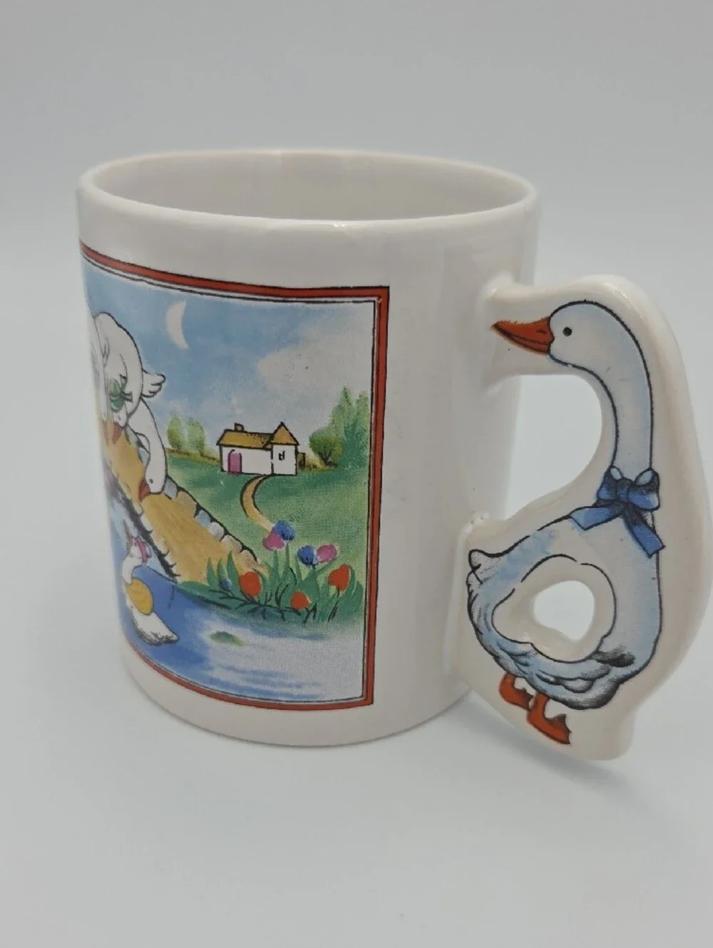 White Ceramic Goose Handle Mug with Colorful Farm Scene